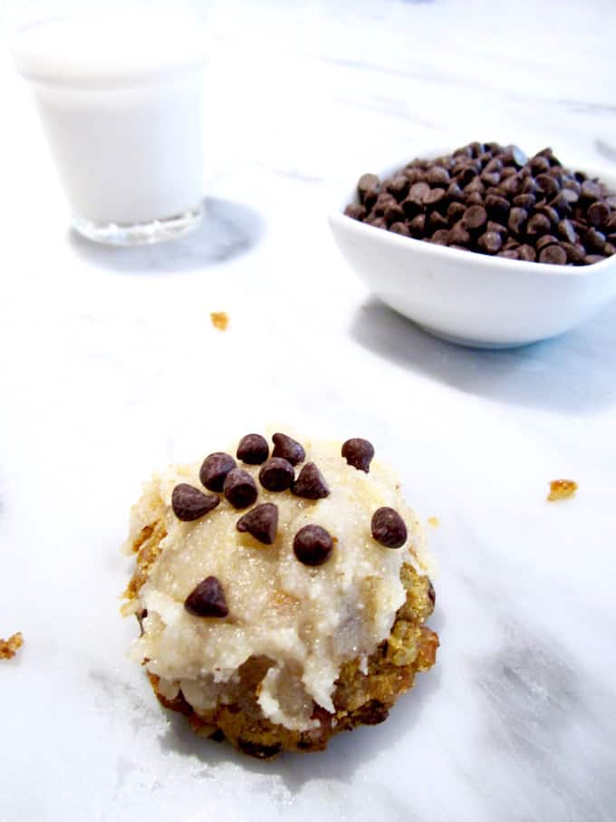 Vegan & Gluten Free Pumpkin Chocolate Chip Muffin Top Cookies with Coconut Frosting - soft baked cookies with a muffin top texture make a sweet, delightful treat for fall! Impression your non vegan and gluten free friends with this recipe. | veganchickpea.com