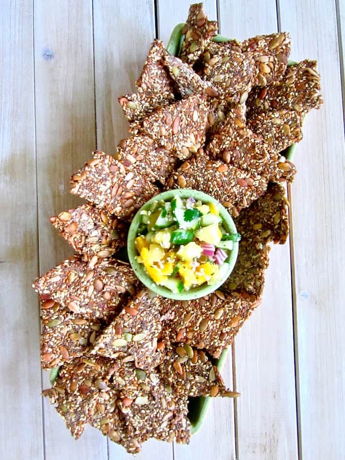 Grain-Free Multiseed Crackers with Mango Pineapple Cucumber Salsa recipe - super healthy, high protein crunchy crackers made simply out of seeds and seasonings. Paired with fresh, zesty, sweet and chunky salsa! [vegan, paleo, gluten/oil/soy/sugar/nut free] | veganchickpea.com