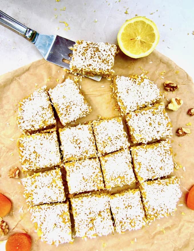 This No Bake Apricot Turmeric Lemon Energy Bars recipe has a lovely citrusy, tangy flavor and make a super healthy sugar free, vegan and gluten free snack! They are an energizing powerhouse filled with fiber, protein, antioxidants and anti-inflammatory properties. | veganchickpea.com