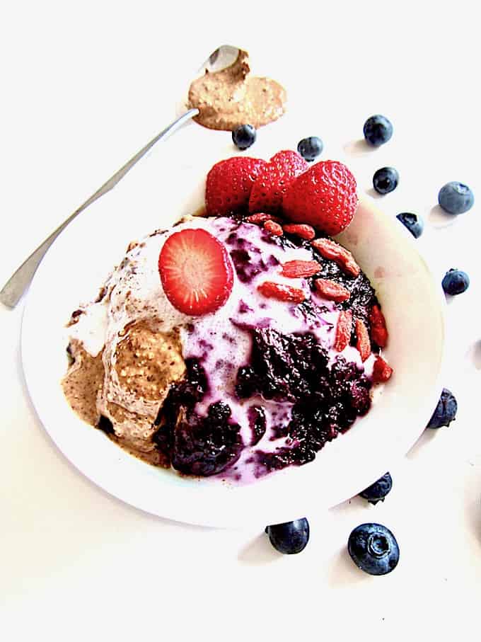 TTruly The Best Sugar Free Berry Chia Porridge recipe - satisfyingly thick (no milk needed!), perfectly sweet with no added sugars, high protein & ready in just 15 minutes! Enjoy it warm or cold with your choice of toppings. [Vegan, Gluten Free, Paleo, Grain Free] | veganchickpea.com 