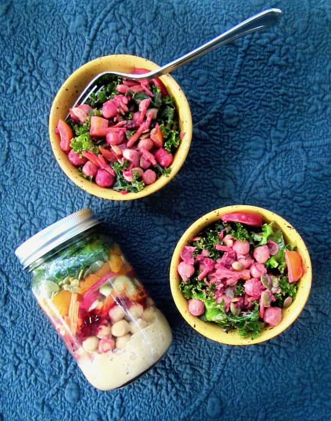 This colorful and nutritious Massaged Kale Salad is loaded with raw veggies, chickpeas and a Chili Vegan Ranch Dressing. Mason jars containers make for a convenient, grab-and-go option for an easy make ahead lunch recipe! {vegan, GF} | veganchickpea.com 