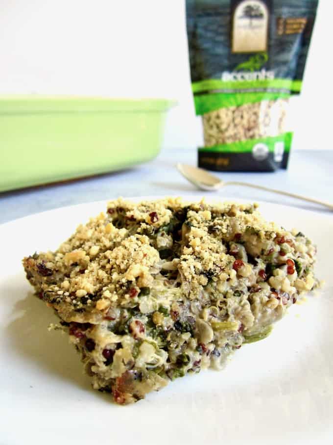 This healthy Spinach & Artichoke Quinoa Casserole recipe (gluten free) unites the classic combo of Spinach & Artichoke Dip with an American family favorite - the hearty casserole! Using organic truRoots quinoa, this recipe makeover is filled with plant based protein and delivers a vegan meal that the whole family will enjoy out of the oven or for leftovers the next day. | veganchickpea.com