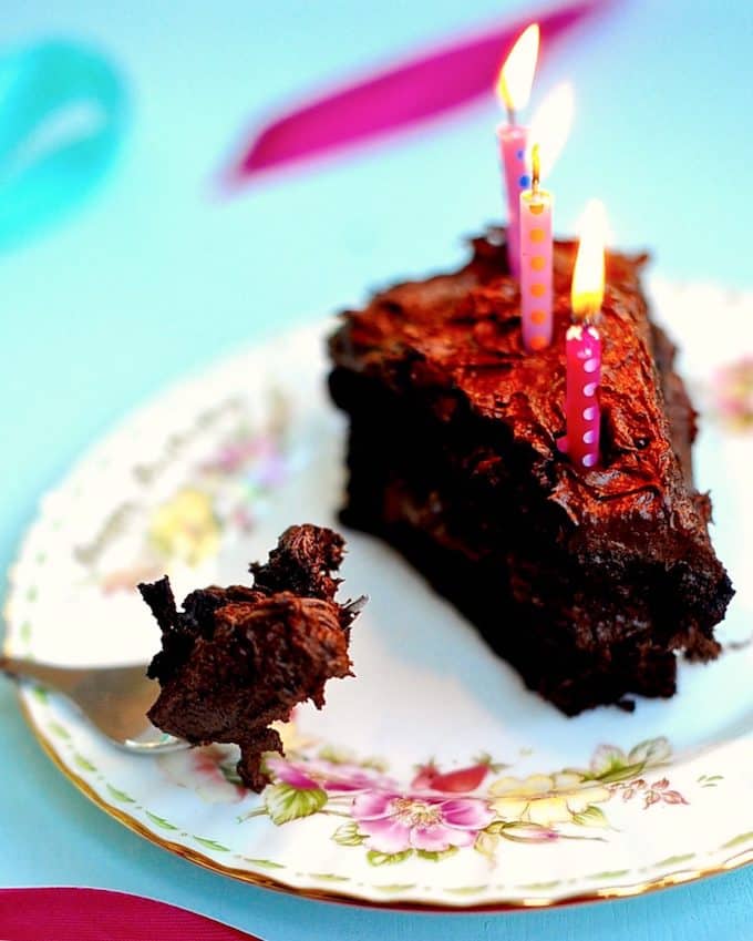 This gorgeous and decadent Gluten Free Vegan Chocolate Cake with Nutella Frosting makes the perfect birthday cake! No dairy, eggs or gluten needed to make creamy frosting and delectable, moist cake. Us gluten free vegans can have our cake and eat it too with this recipe (sugar free option included)!
