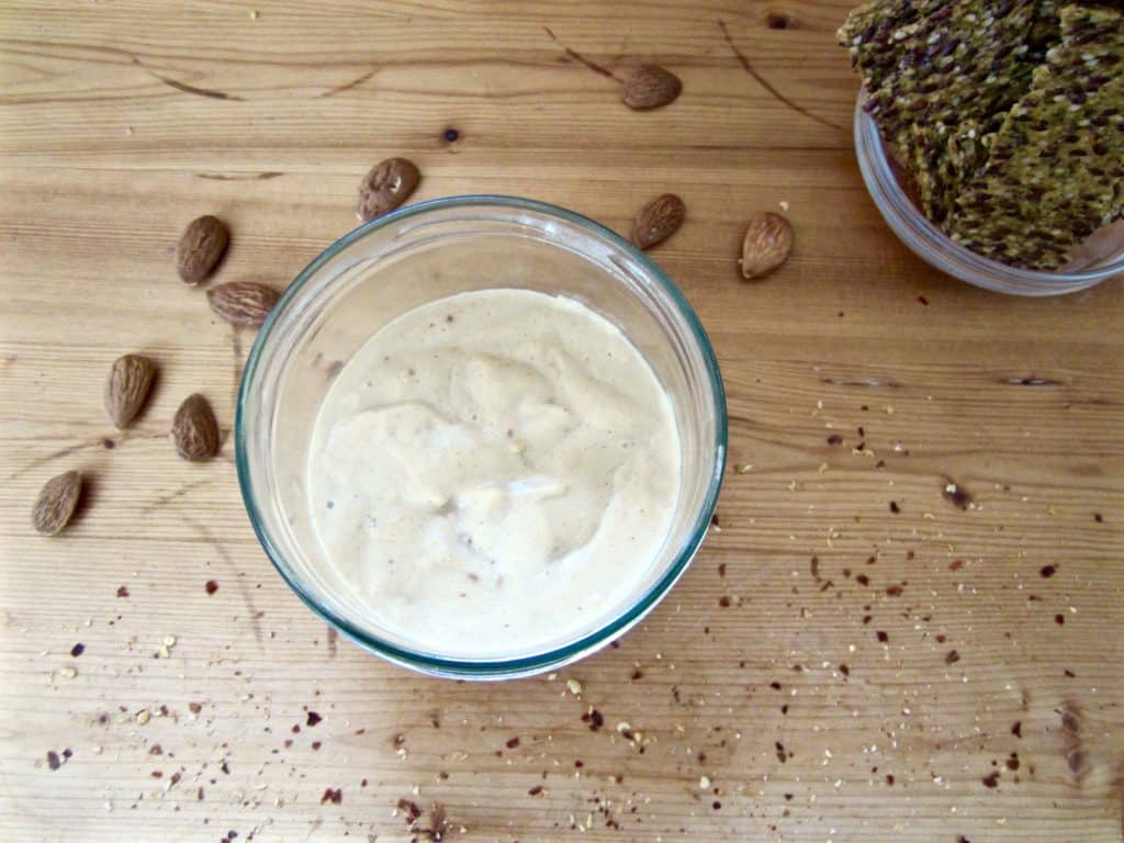 Super simple spicy almond cheese - use as a spread on crackers or as a sauce in common dishes like nachos, pizzas and pastas. Vegan, gluten free, soy free + paleo | veganchickpea.com