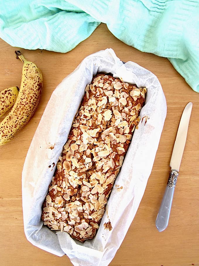 ALT TEXT: Easy & healthy vegan + gluten free one bowl Banana Nut Bread recipe! Protein packed with 7 grams per slice. {refined sugar free, oil free} | veganchickpea.com