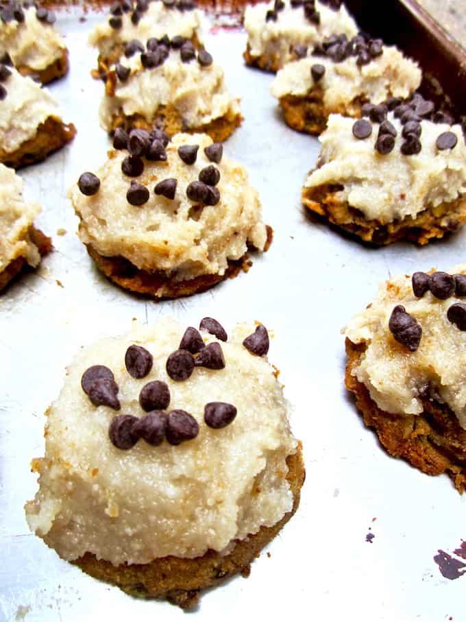 Vegan & Gluten Free Pumpkin Chocolate Chip Muffin Top Cookies with Coconut Frosting - soft baked cookies with a muffin top texture make a sweet, delightful treat for fall! Impression your non vegan and gluten free friends with this recipe. | veganchickpea.com