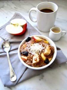 Warm 5 Minute Vanilla Flaxseed Cereal (Vegan + Gluten Free) - This warm, creamy porridge comes together in just 5 minutes. Substitute whatever fruit and dried fruit you want, making this a versatile recipe perfect for busy mornings! | veganchickpea.com #shop #ad #SilkandSimplyPureCreamers #cbias