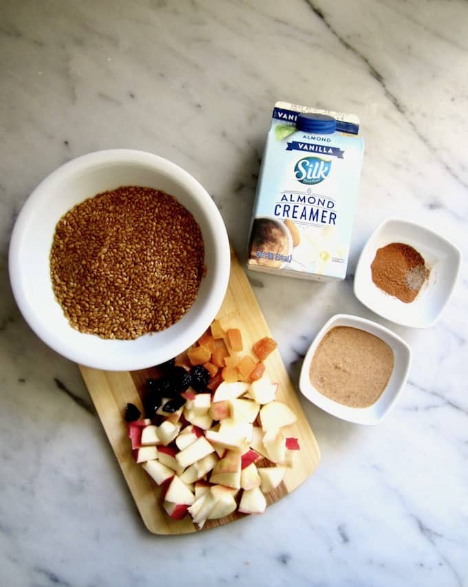 Warm 5 Minute Vanilla Flaxseed Cereal (Vegan + Gluten Free) - This warm, creamy porridge comes together in just 5 minutes. Substitute whatever fruit and dried fruit you want, making this a versatile recipe perfect for busy mornings! | veganchickpea.com #shop #ad #SilkandSimplyPureCreamers #cbias