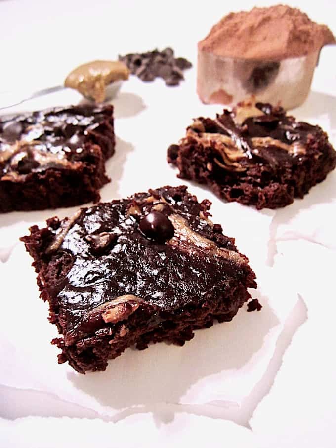 Flourless Sunflower Seed Butter Swirl Brownies recipe - these easy brownies have only 9 ingredients and take 15 minutes to prepare! A low sugar dessert that’s vegan, paleo, refined sugar free, gluten free and oil free! | veganchickpea.com 