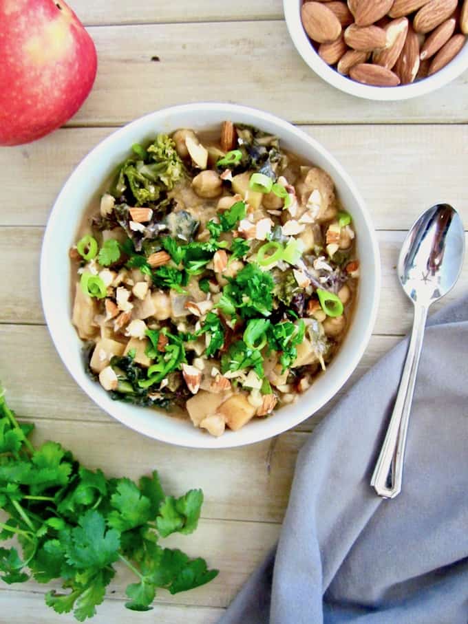 Apple, Almond, Kale & Chickpea Stew recipe - A healthy and simple recipe using only 9 ingredients! Savory and sweet with a bit of spice and protein makes this a perfectly balanced meal! Gluten free, sugar free, oil free. | veganchickpea.com