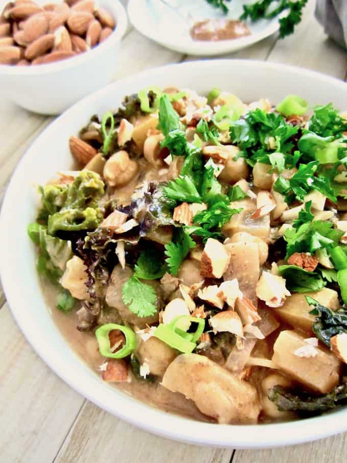 Apple, Almond, Kale & Chickpea Stew recipe - A healthy and simple recipe using only 9 ingredients! Savory and sweet with a bit of spice and protein makes this a perfectly balanced meal! Gluten free, sugar free, oil free. | veganchickpea.com 