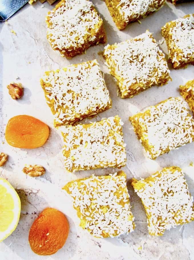 This No Bake Apricot Turmeric Lemon Energy Bars recipe has a lovely citrusy, tangy flavor and make a super healthy sugar free, vegan and gluten free snack! They are an energizing powerhouse filled with fiber, protein, antioxidants and anti-inflammatory properties. | veganchickpea.com