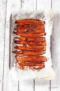 Using mushrooms, coconut, eggplant, rice paper, nuts, tofu, tempeh or carrots, Vegan Bacon is salty and sweet, with a crispy and chewy texture. This creative recipe roundup highlights bloggers who show us how it's done!