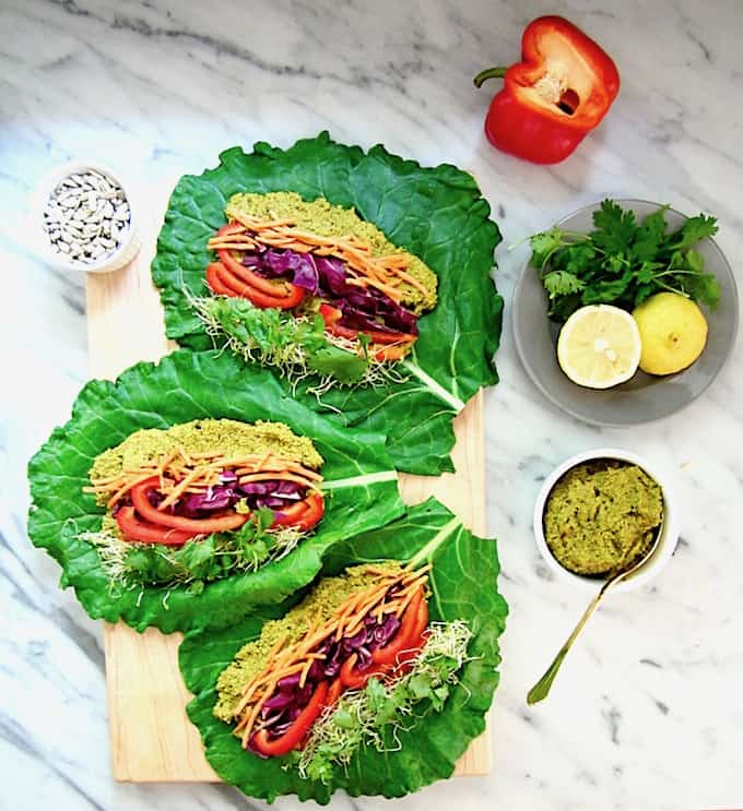 This Raw Rainbow Collard Green Wraps with Curry Sunflower Seeds recipe is a super healthy, crunchy lunch you can make ahead that will leave you feeling fresh & energized. It’s customizable with whatever veggies you want, low carb and friendly for all diets! {vegan, gluten free, paleo, whole 30, sugar free, soy free} | veganchickpea.com