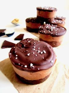  These deliciously addictive yet healthy Salted Chocolate Peanut Butter Pie Protein Cups are perfectly balanced between sweet with salty - all without any refined sugars! - and pack a protein punch with about 11 grams per serving. This easy no bake recipe will be your go-to healthy dessert or snack! {Vegan, Gluten Free + Paleo}