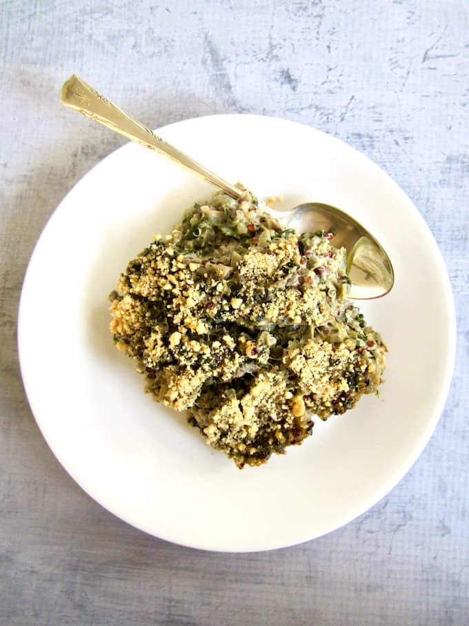 This healthy Spinach & Artichoke Quinoa Casserole recipe (gluten free) unites the classic combo of Spinach & Artichoke Dip with an American family favorite - the hearty casserole! Using organic truRoots quinoa, this recipe makeover is filled with plant based protein and delivers a vegan meal that the whole family will enjoy out of the oven or for leftovers the next day. | veganchickpea.com