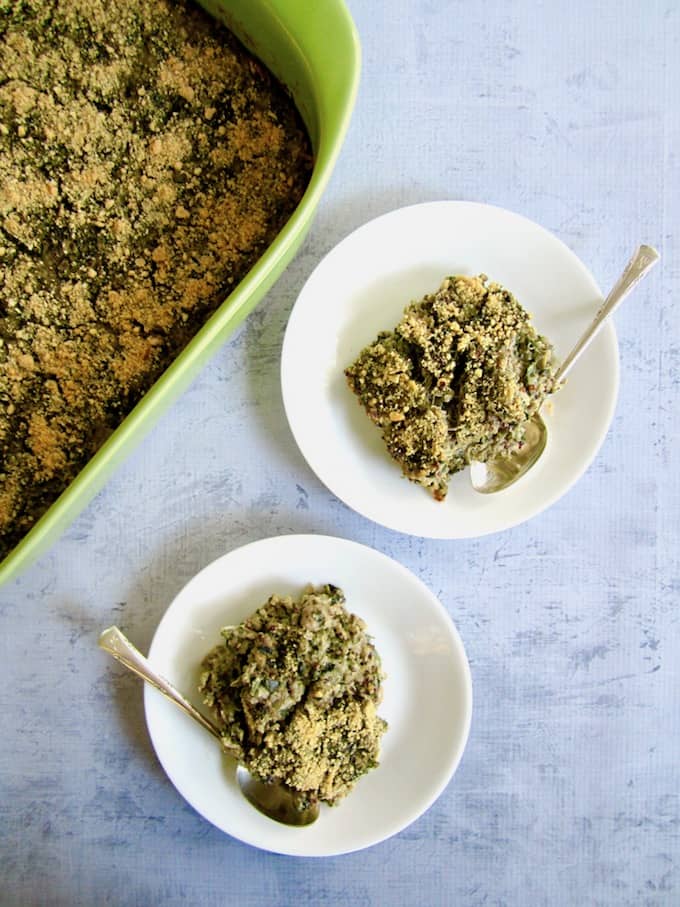 This healthy Spinach & Artichoke Quinoa Casserole recipe (gluten free) unites the classic combo of Spinach & Artichoke Dip with an American family favorite - the hearty casserole! Using organic truRoots quinoa, this recipe makeover is filled with plant based protein and delivers a vegan meal that the whole family will enjoy out of the oven or for leftovers the next day. | veganchickpea.com