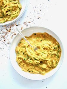 This super healthy yet satisfying and craveable 'mac & cheese' recipe mimics the flavor of the classic dish with a superbly easy, 5-ingredient vegan cheese sauce made out of sweet potatoes. Served over zucchini noodles (zoodles), this gluten free, flavor packed and  veggie-filled dish is also low carb, oil-free and comes together in 30 minutes. You won't believe it's cheese-less!
