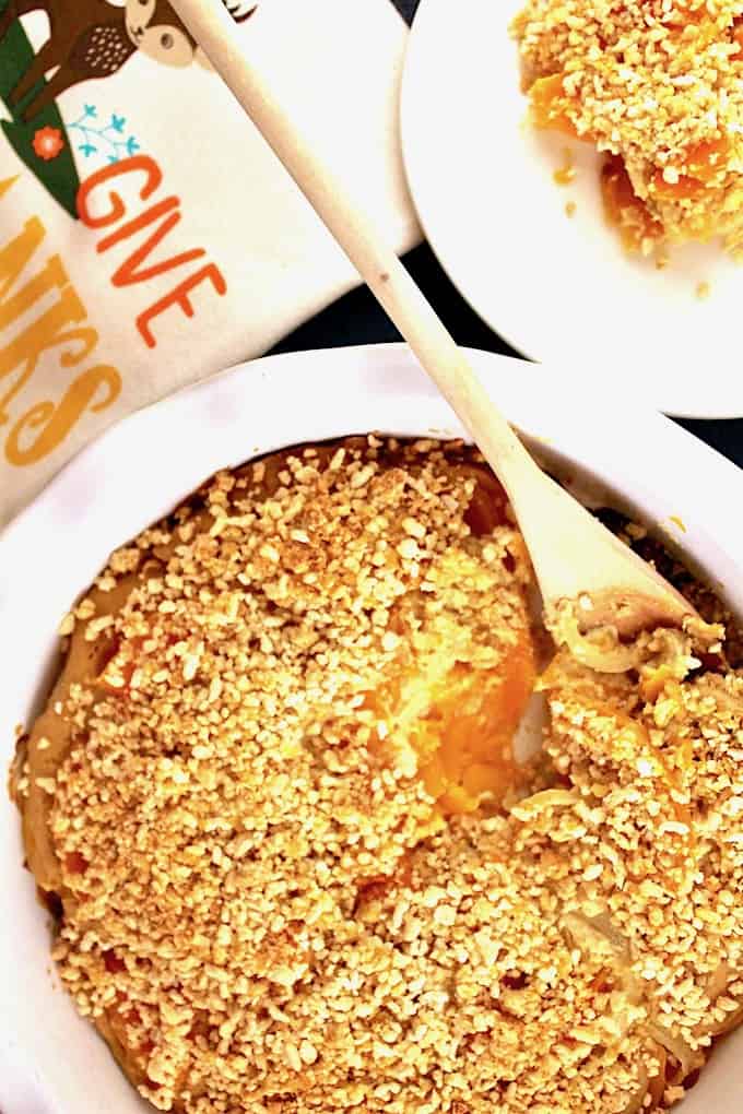 This savory Vegan Butternut Squash Gratin (Gluten Free) is healthy comfort food at its best! Perfect for Fall or your Thanksgiving or holiday table, you'll love this creamy casserole topped with a crispy vegan 'parmesan' topping and Panko breadcrumbs.