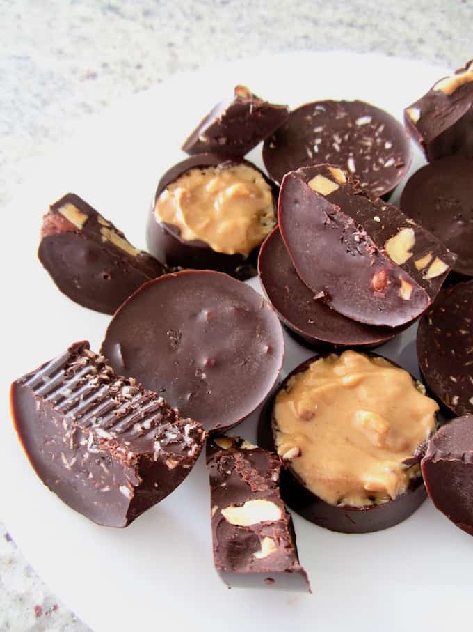 It's super easy and fun to make your own vegan and keto chocolate fat bombs (it's just 4 ingredients plus salt)! These chocolates are completely sugar-free with only 1 net carb per serving, plus are customizable--mix in nuts, seeds, nut butter, coconut or whatever combination of fillings your heart desires. 