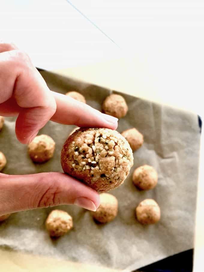 Close up of easy protein bites that are sweet and satisfying with absolutely no sugar! These Fat bombs are friendly for a vegan, gluten free or keto diet.