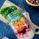 This colorful and nutritious Massaged Kale Salad is loaded with raw veggies, chickpeas and a Chili Vegan Ranch Dressing. Mason jars containers make for a convenient, grab-and-go option for an easy make ahead lunch recipe! {vegan, GF} | veganchickpea.com